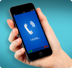 A hand holding a smartphone calling someone.